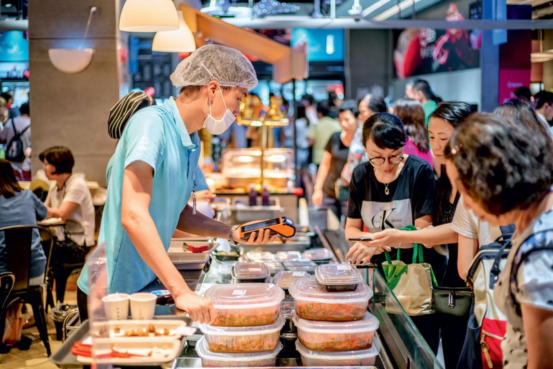 July 29, 2018: Customers shop at a Hema Xiansheng fresh food supermarket, Alibaba’s new online-to-offline platform. Trends in the fresh food e-commerce industry reflect rising living standards in China, as consumers are focusing more on quality of life and are willing to pay for it. IC